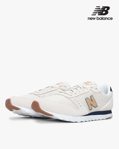 New balance cheap 311 women gold