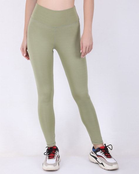 Sports tights in SoftMove™ - Dark khaki green - Ladies | H&M IN