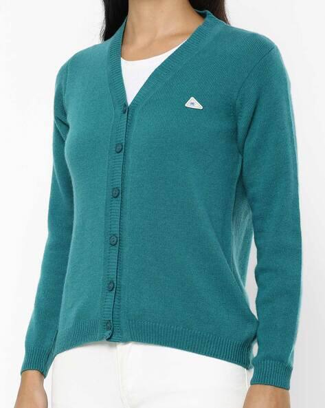 light green button up sweater