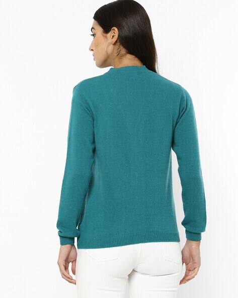 light green button up sweater