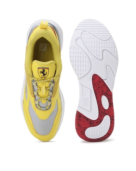 Puma ferrari hotsell yellow shoes