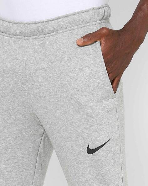 Buy Nike Men Black Solid Straight Fit NK THRMA DRI FIT Solid Joggers   Track Pants for Men 10702590  Myntra