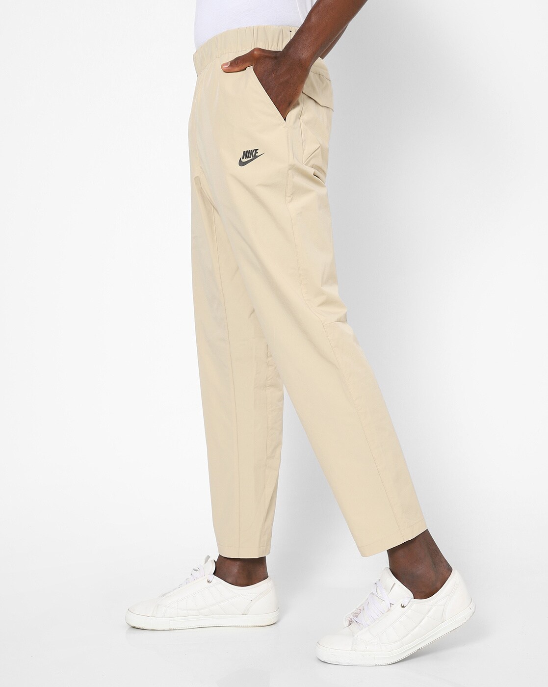 nike track pants beige