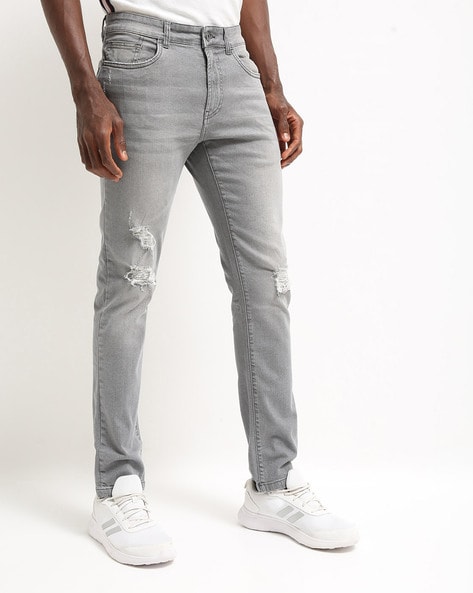 Light-Wash Distressed Slim Fit Jeans