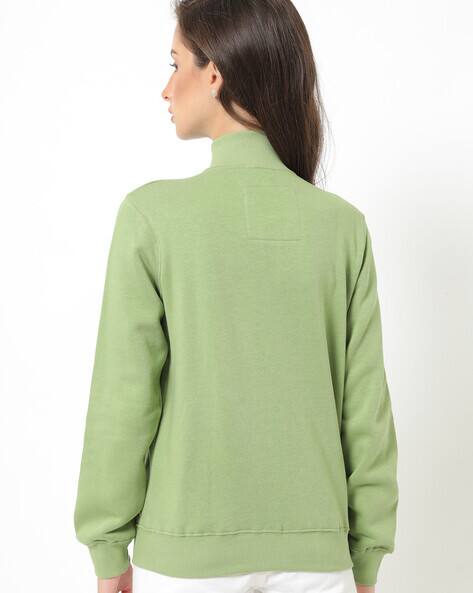 light green sweatshirt