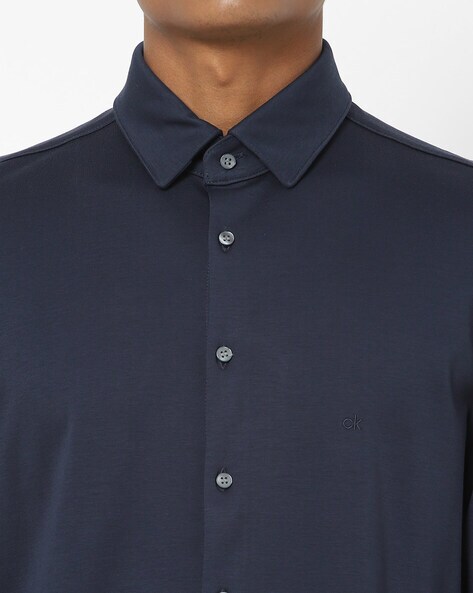 Calvin Klein LIQUID TOUCH SLIM FIT - Polo shirt - calvin navy/dark
