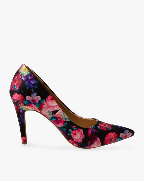 Mint colored high heel shoes with pink floral bouquet and butterflies