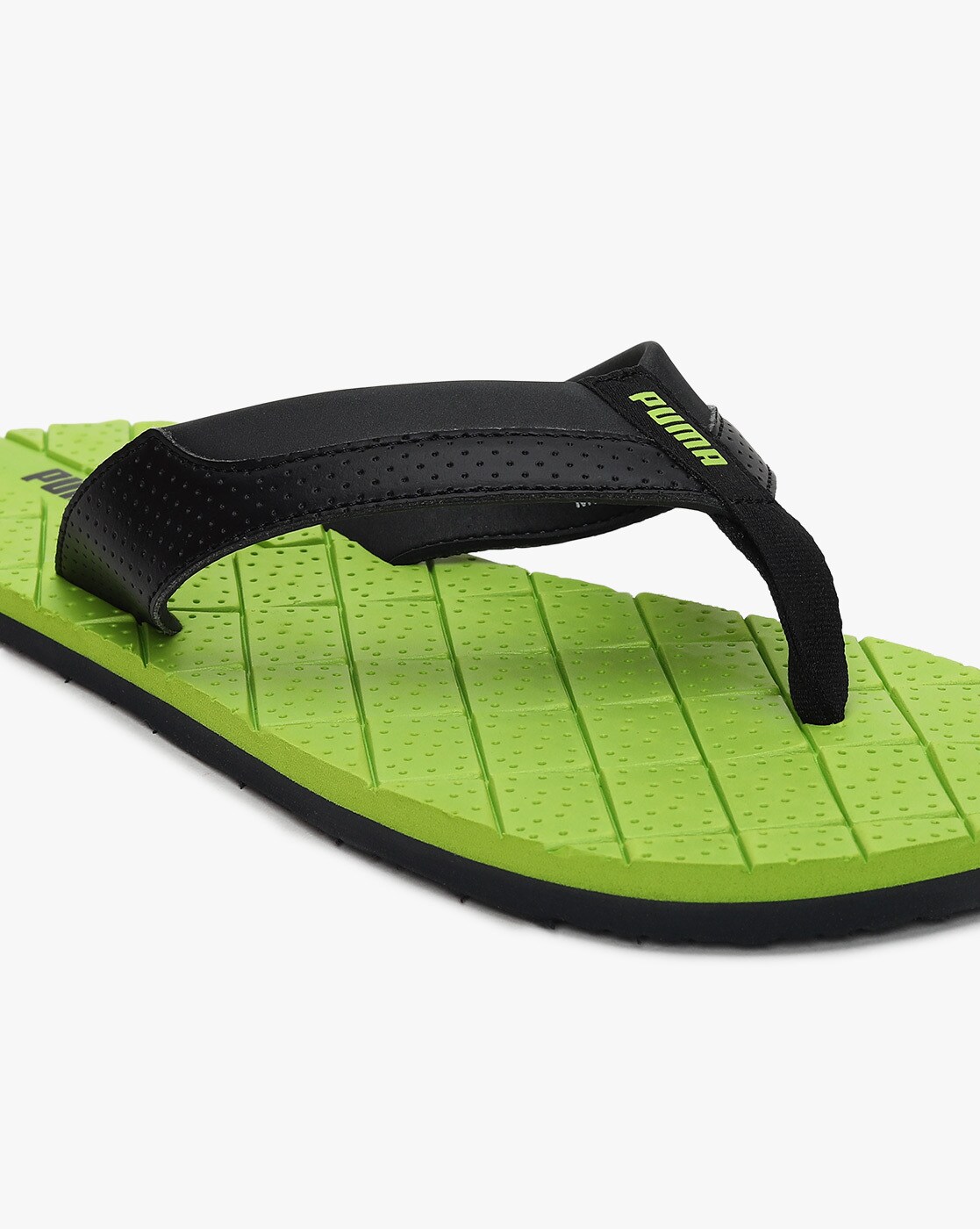 Puma black and green flip flops best sale