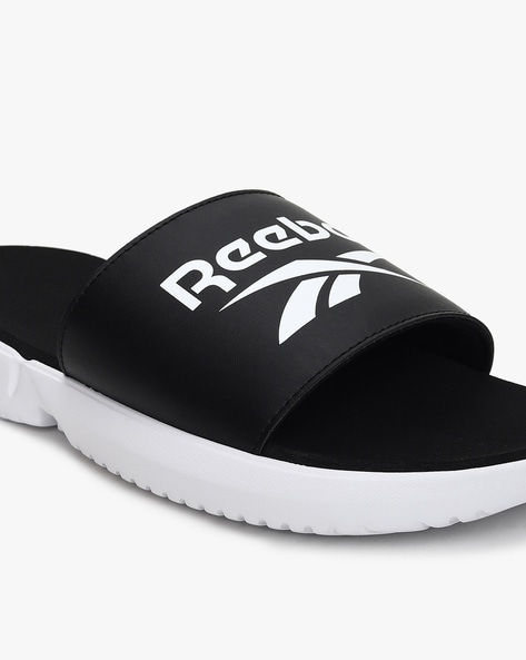 Reebok discount slides black