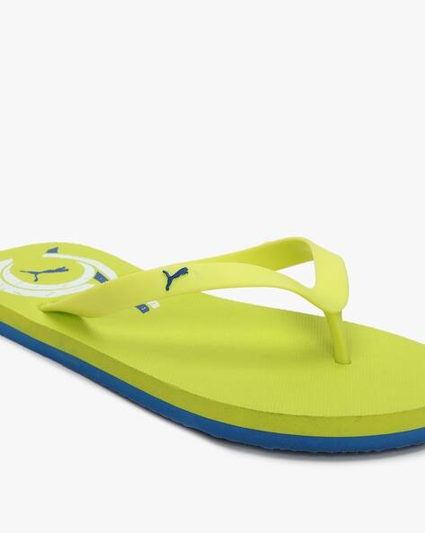 puma yellow flip flops