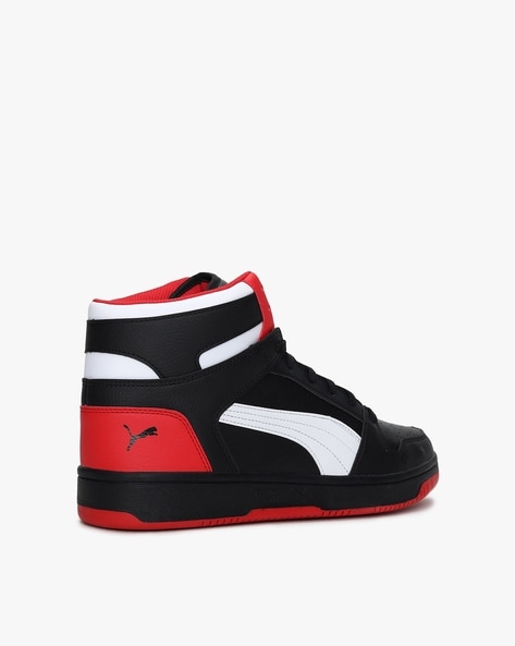 Red and black deals puma sneakers