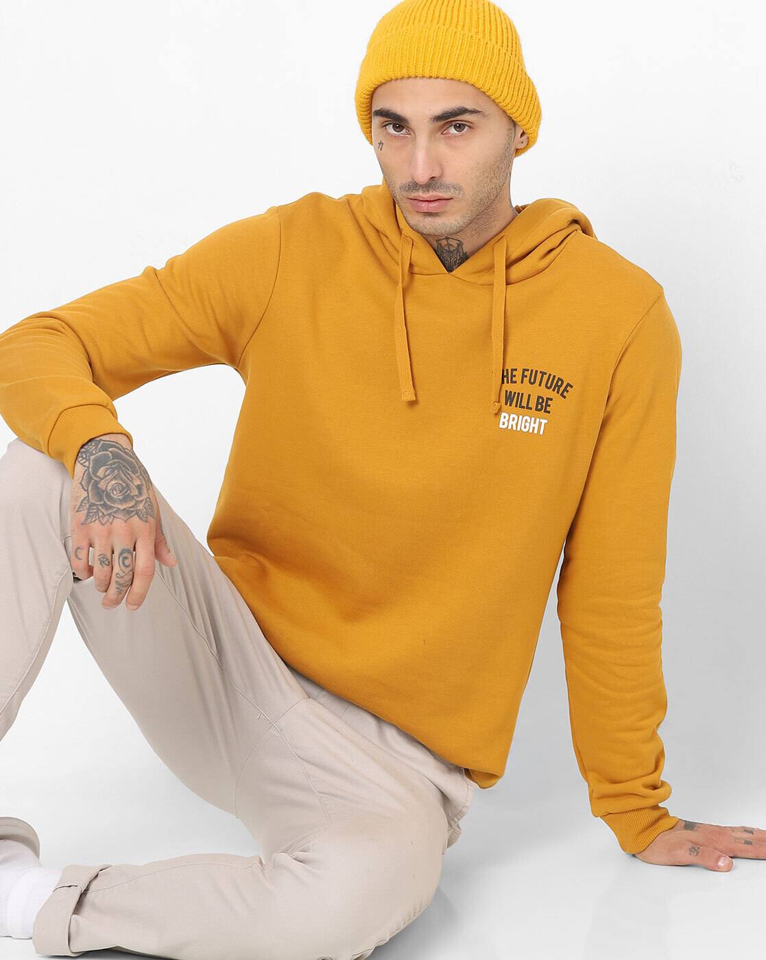 mustard yellow sweatshirt