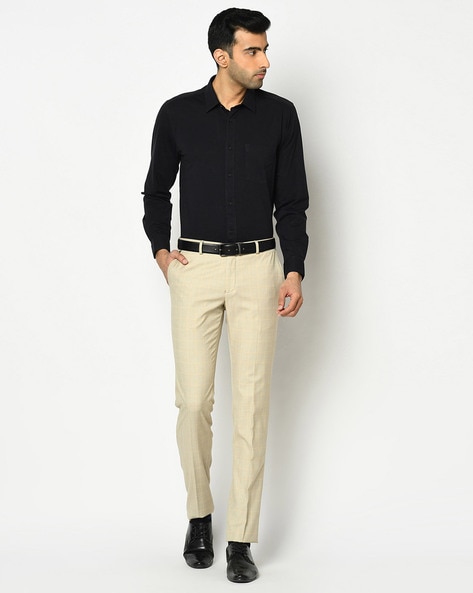 cream colour coat pant with black shirt