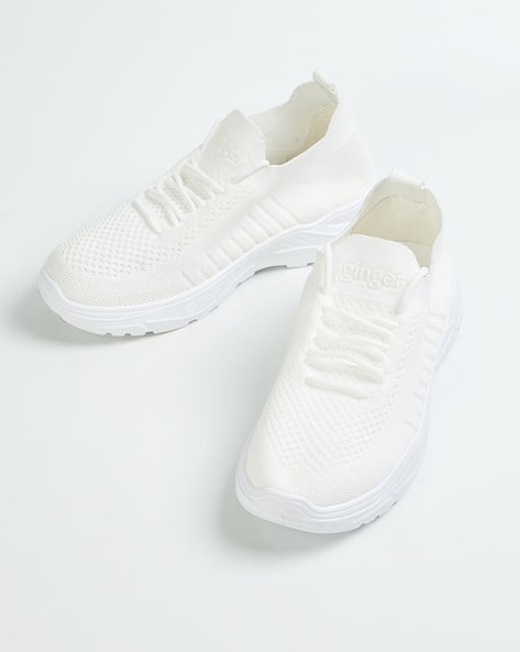 solid white sneakers