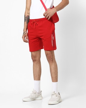 nike stussy red shorts