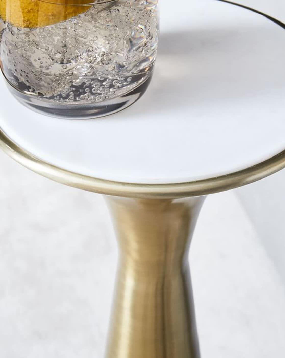 silhouette pedestal drink table