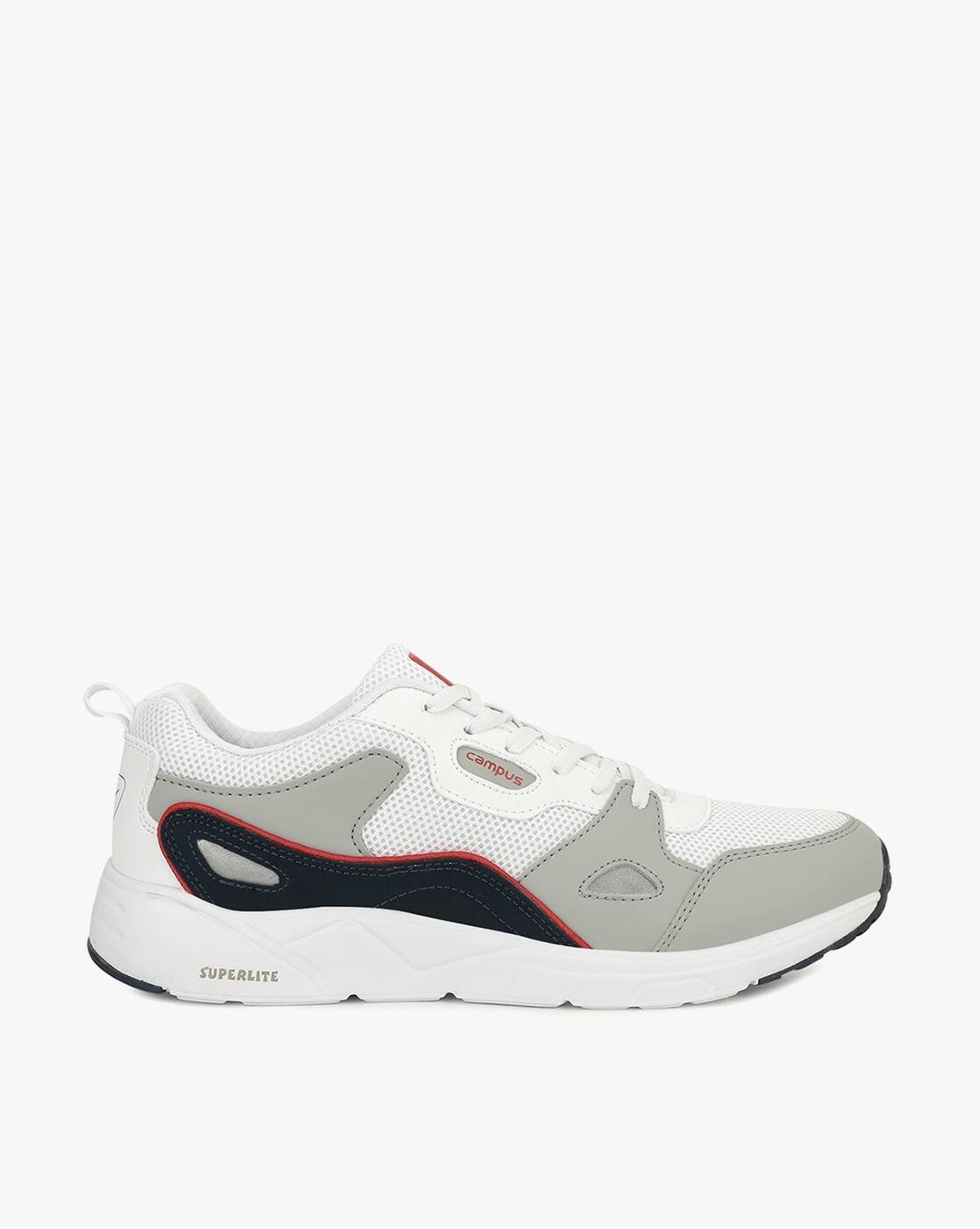 Buy White Sports Shoes for Men by 
