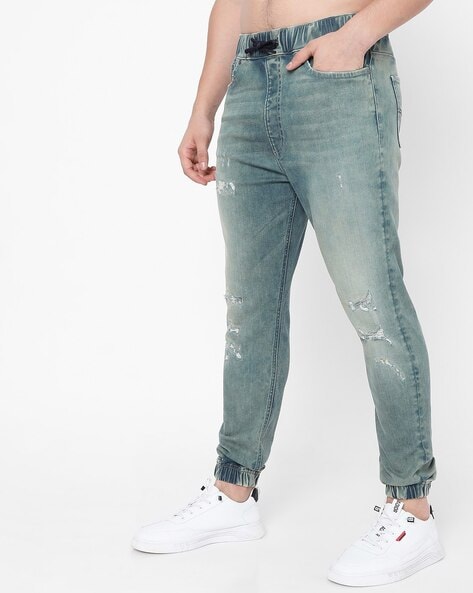 Mid blue orson 2024 slim leg jeans