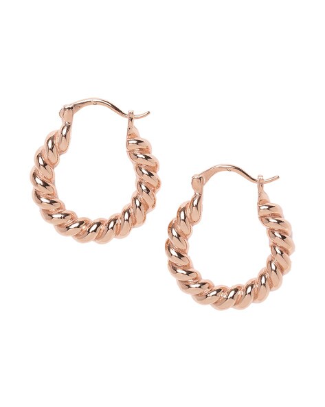 Bottega Veneta® Women's Pillar Twisted Hoop Earrings in Silver. Shop online  now.