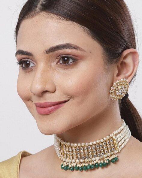 Buy online Gold Plated Polki Studded Pearl Beaded Intricate Choker Set from  Sets for Women by Saraf Rs Jewellery for ₹2249 at 69% off | 2024  Limeroad.com