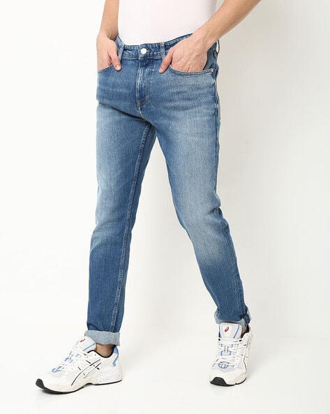 mid rise slim fit jeans meaning