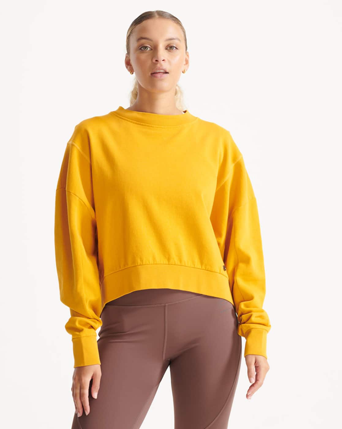 Yellow Sweatshirt With White Sleeve And Blue Arm Patch
