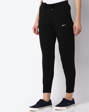radical caricia Comparación Buy Black Track Pants for Women by NIKE Online | Ajio.com