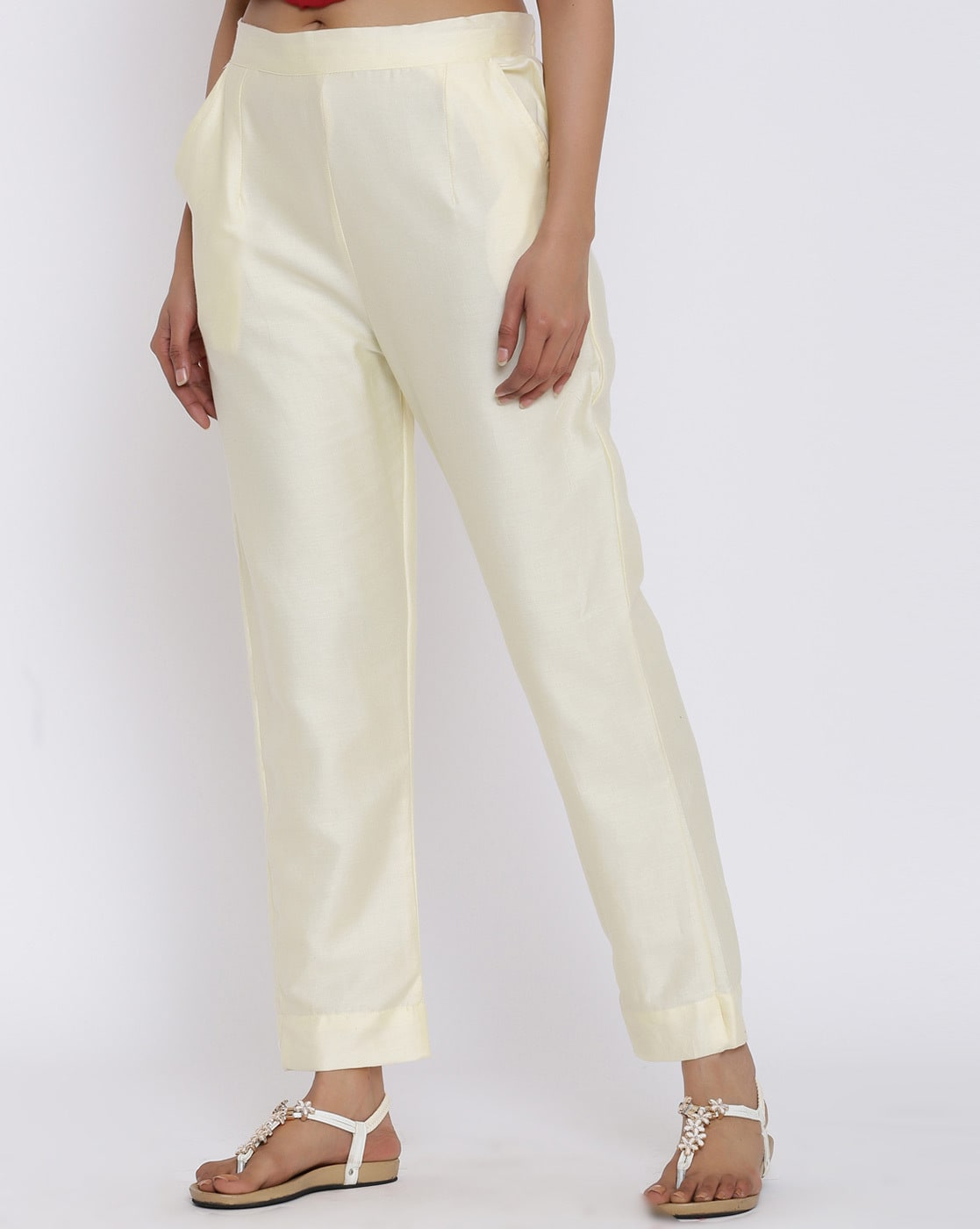 Silk trousers in off-white