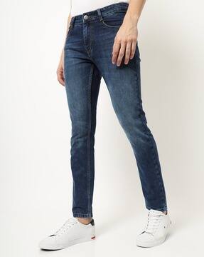 medium wash skinny jeans mens