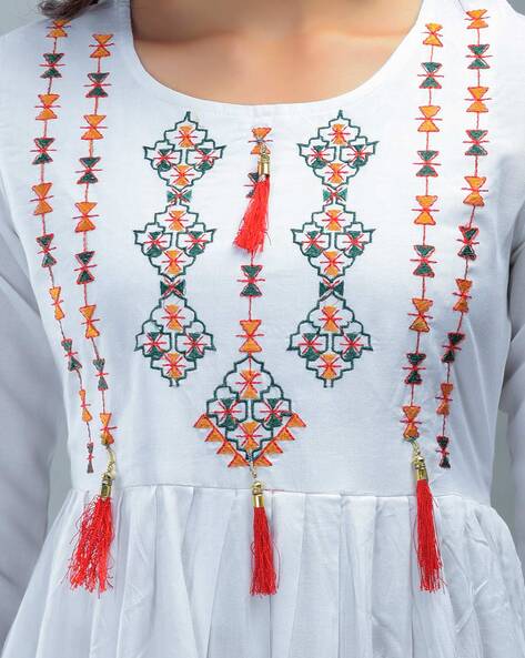 Embroidery designs on white hot sale dress