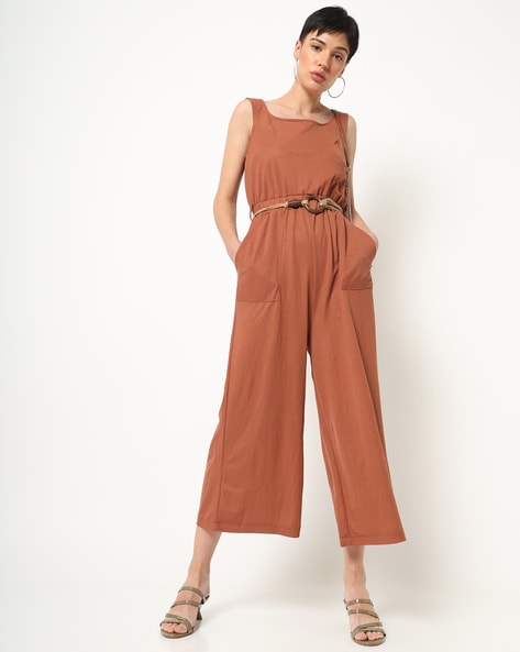 rust jumpsuit outfit