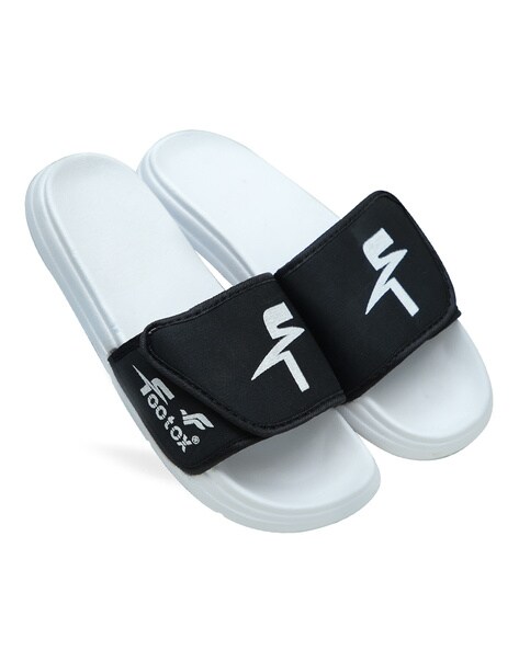 White canvas flip store flops