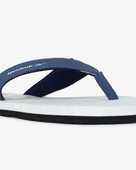 Reebok flip flops discount white