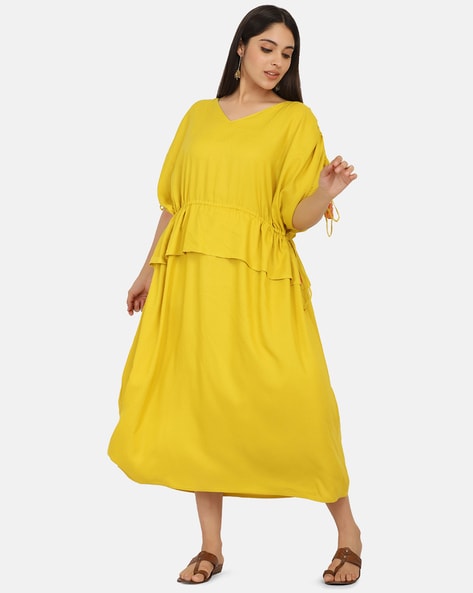 Buy Mustard Dresses for Women by Mirraw come relive India Online