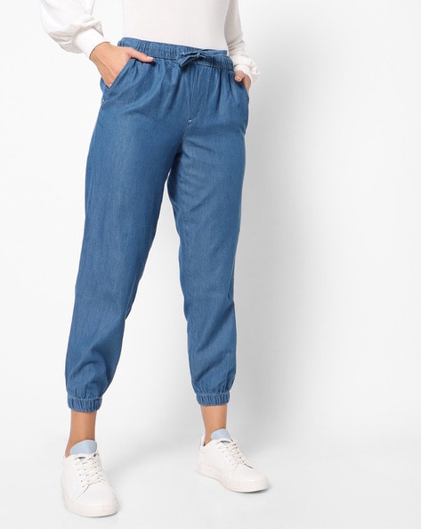 Buy DOLCE CRUDO Blue Women's Rule Of Joy Denim Joggers | Shoppers Stop