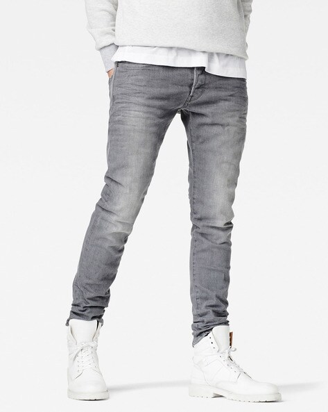 Lightly Washed and Distressed Slim Fit Jeans