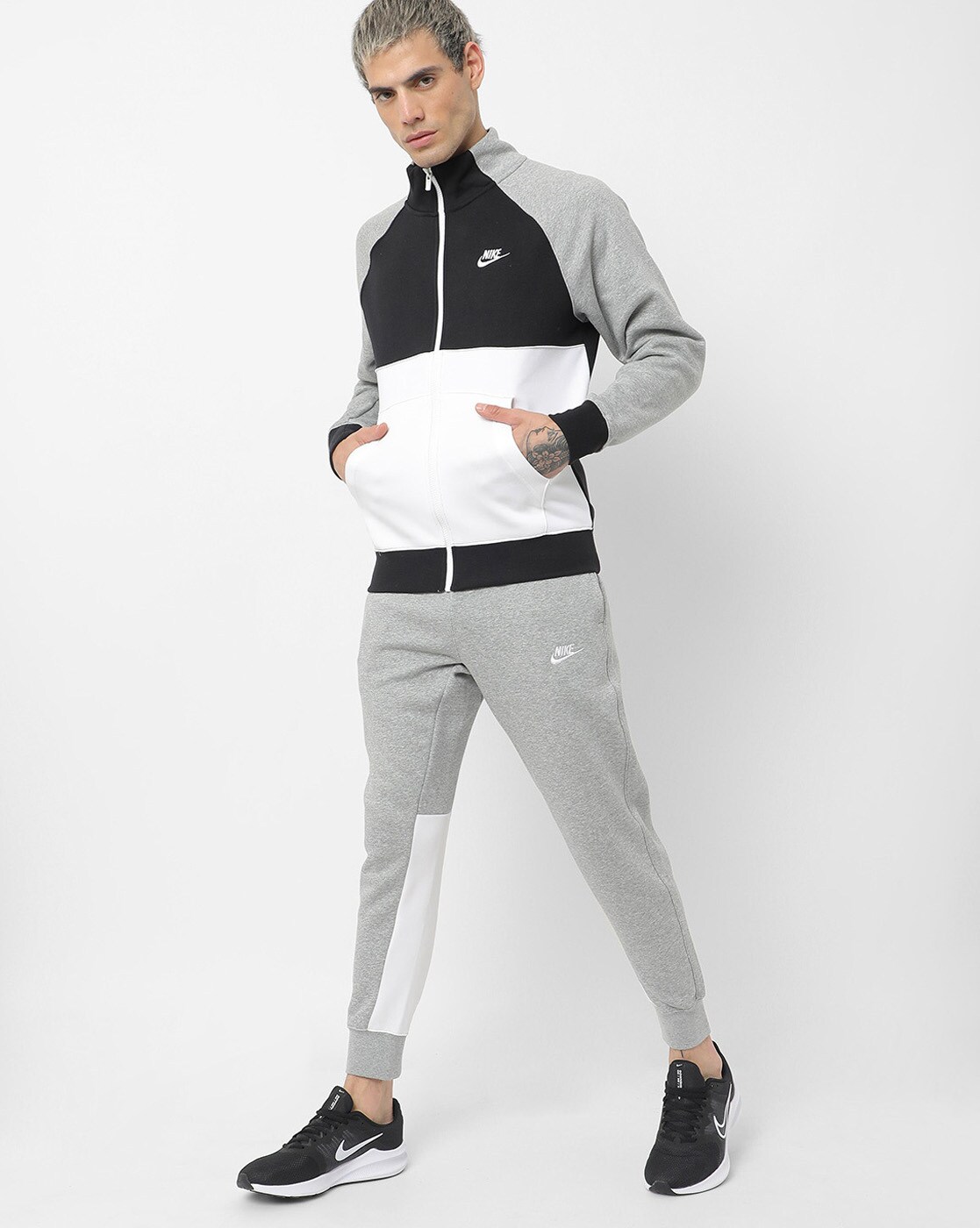 Nike colour block store tracksuit set in black