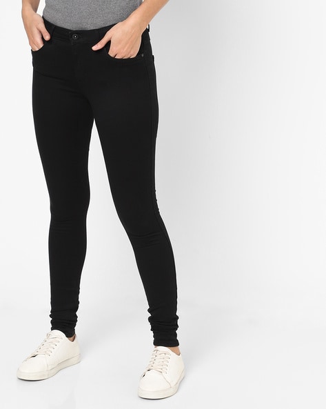Signature low waisted skinny jeans in black leather | Saint Laurent |  YSL.com