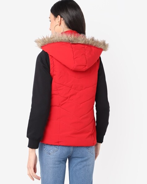 red vest with fur hood