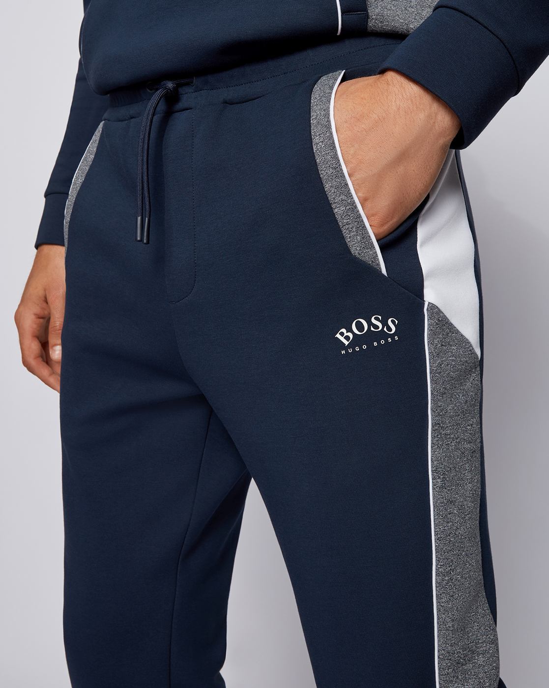 HUGO - Straight-leg tracksuit bottoms with flock-print stacked logos