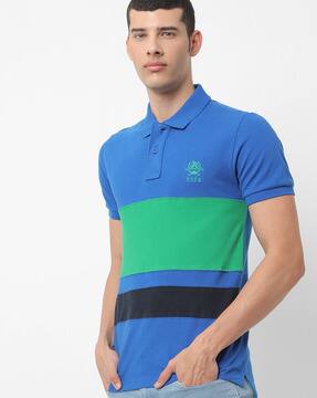 blue and yellow golf shirt