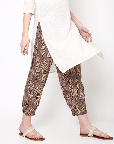 White Printed Harem Pants Design by CoralbySeema at Pernias Pop Up Shop  2023