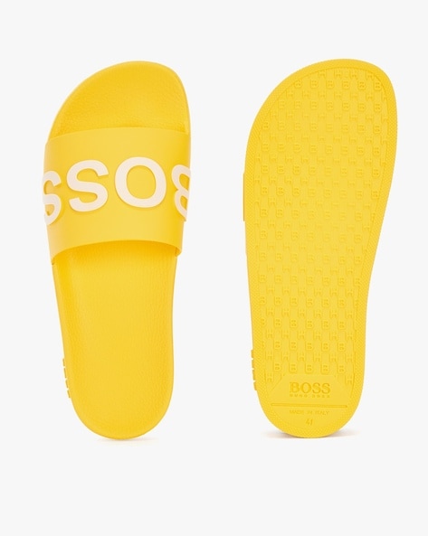 Buy BOSS Embossed Brand Print Slides Yellow Color Men AJIO LUXE