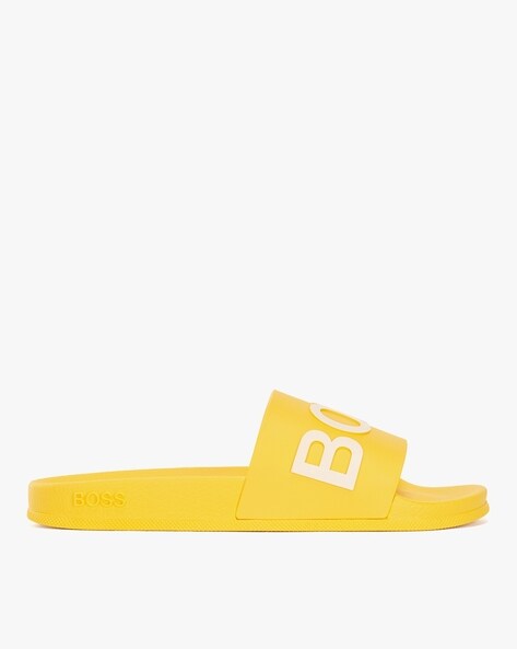 Buy BOSS Embossed Brand Print Slides Yellow Color Men AJIO LUXE