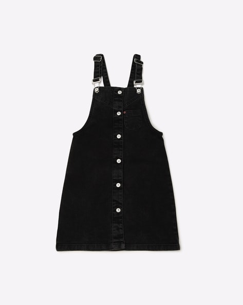 black dungaree dress outfit