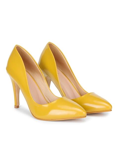 pointed yellow heels