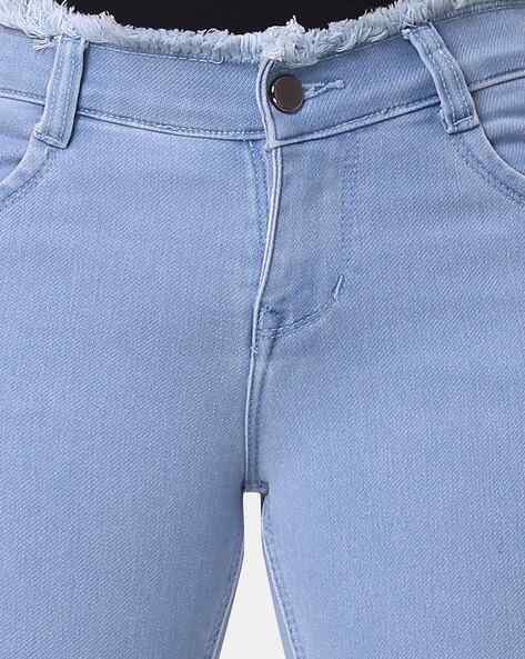 Lightly-Washed Skinny Jeans with Frayed Hems