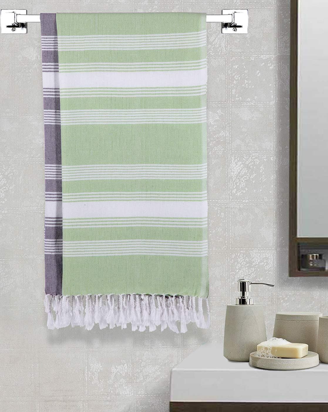 Purple and green bath towels