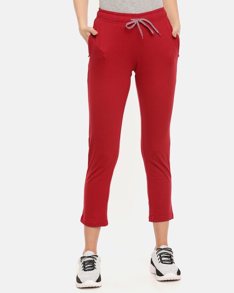 track pants red and white