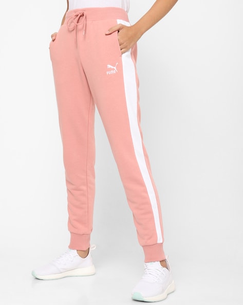 pink and white track pants